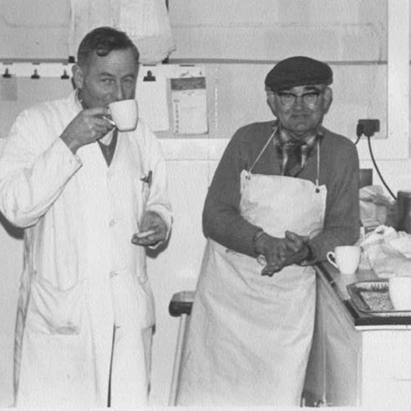 Eric Rodda and Tom Harvey having a tea